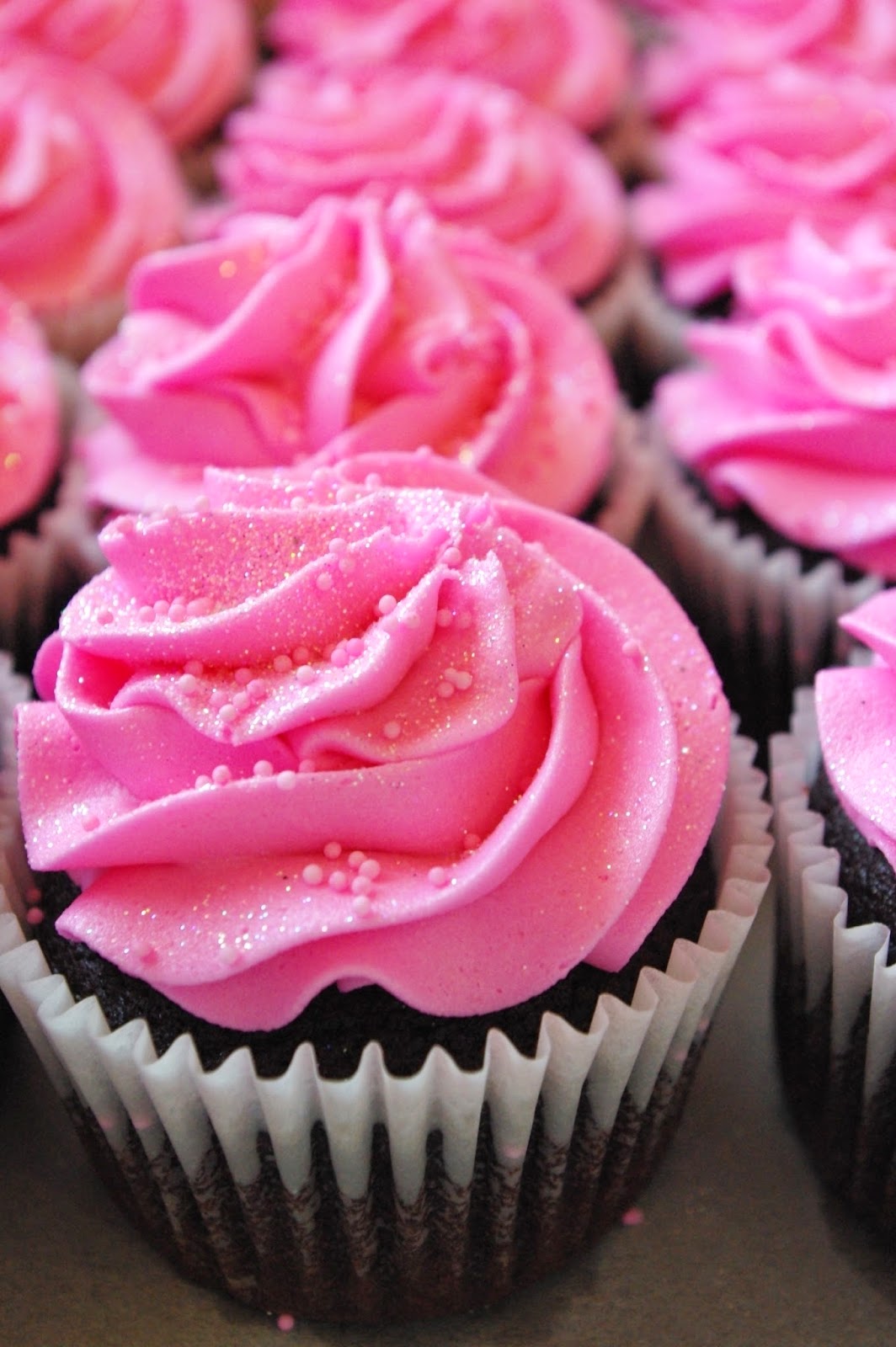 Pink Cupcakes with Chocolate Icing