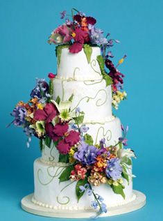 Cascading Wedding Cakes with Wildflowers Cascading Wedding Cakes with Wildflowers