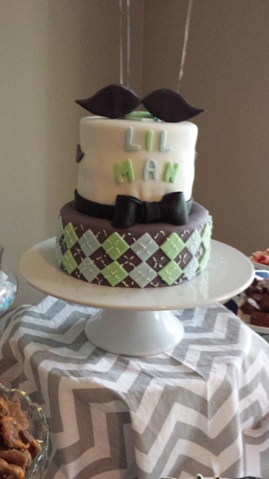 little man themed baby shower cake