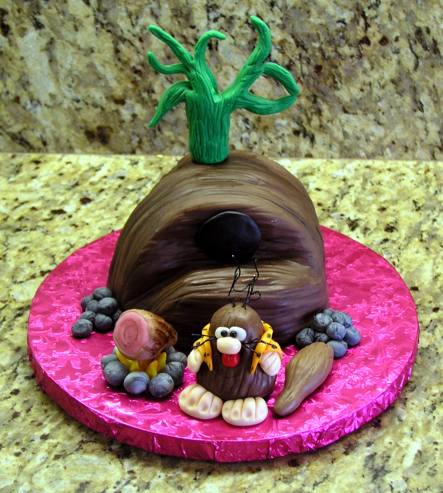 [Image: captain-caveman-cake_793841.jpg]