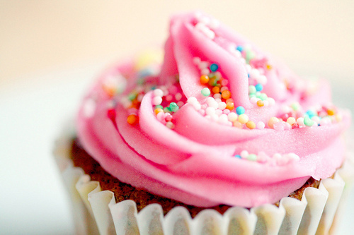 Pink Cupcake with Frosting and Sprinkles