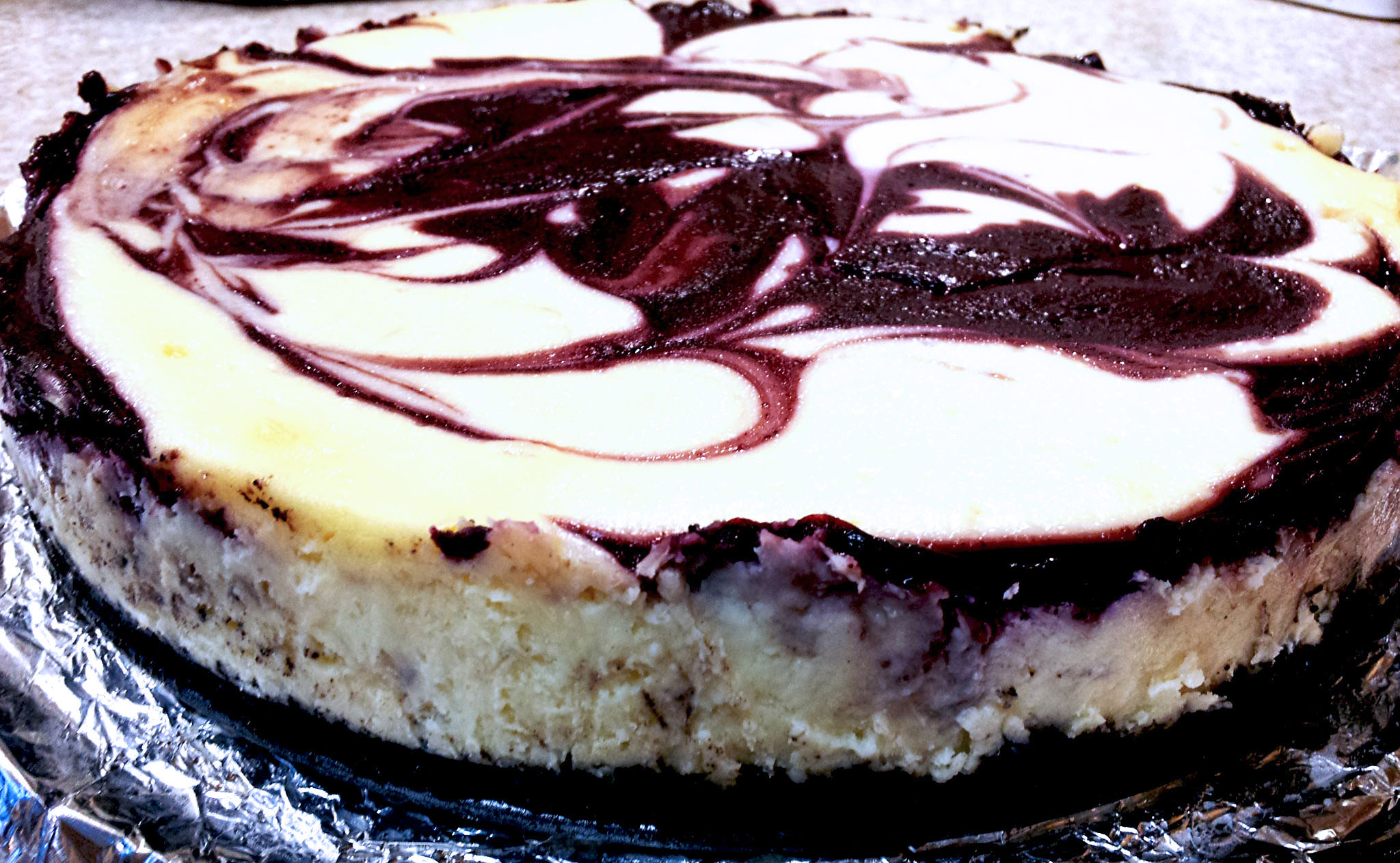 White Chocolate Raspberry Cheesecake with Oreo Crust White Chocolate Raspberry Cheesecake with Oreo Crust