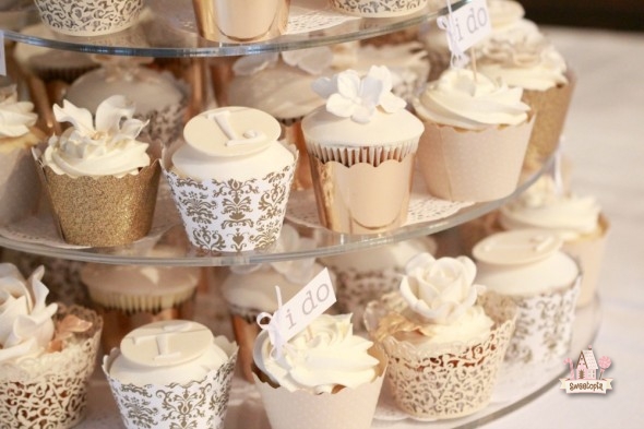 White and Gold Wedding Cake with Cupcakes White and Gold Wedding Cake with Cupcakes