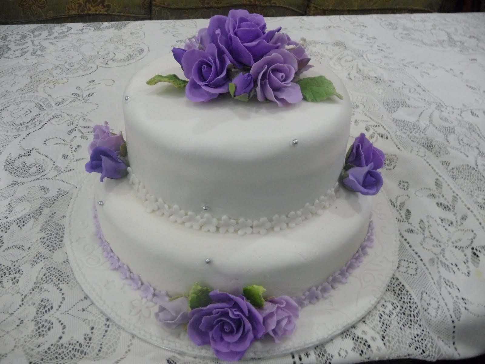 Pictures of a 2 Tier Purple Fondant Wedding Cake