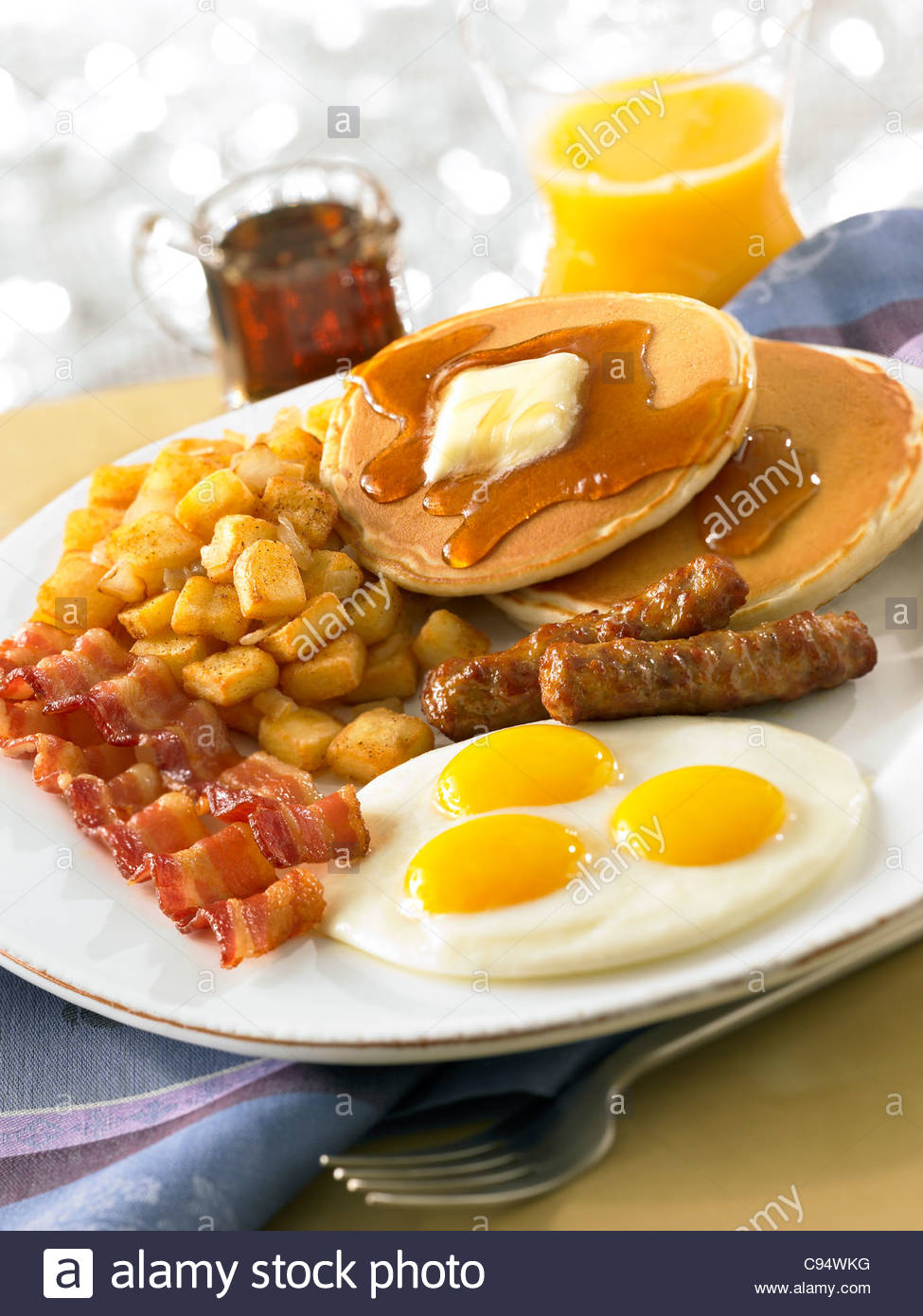 Pancakes Eggs and Bacon Orange Juice