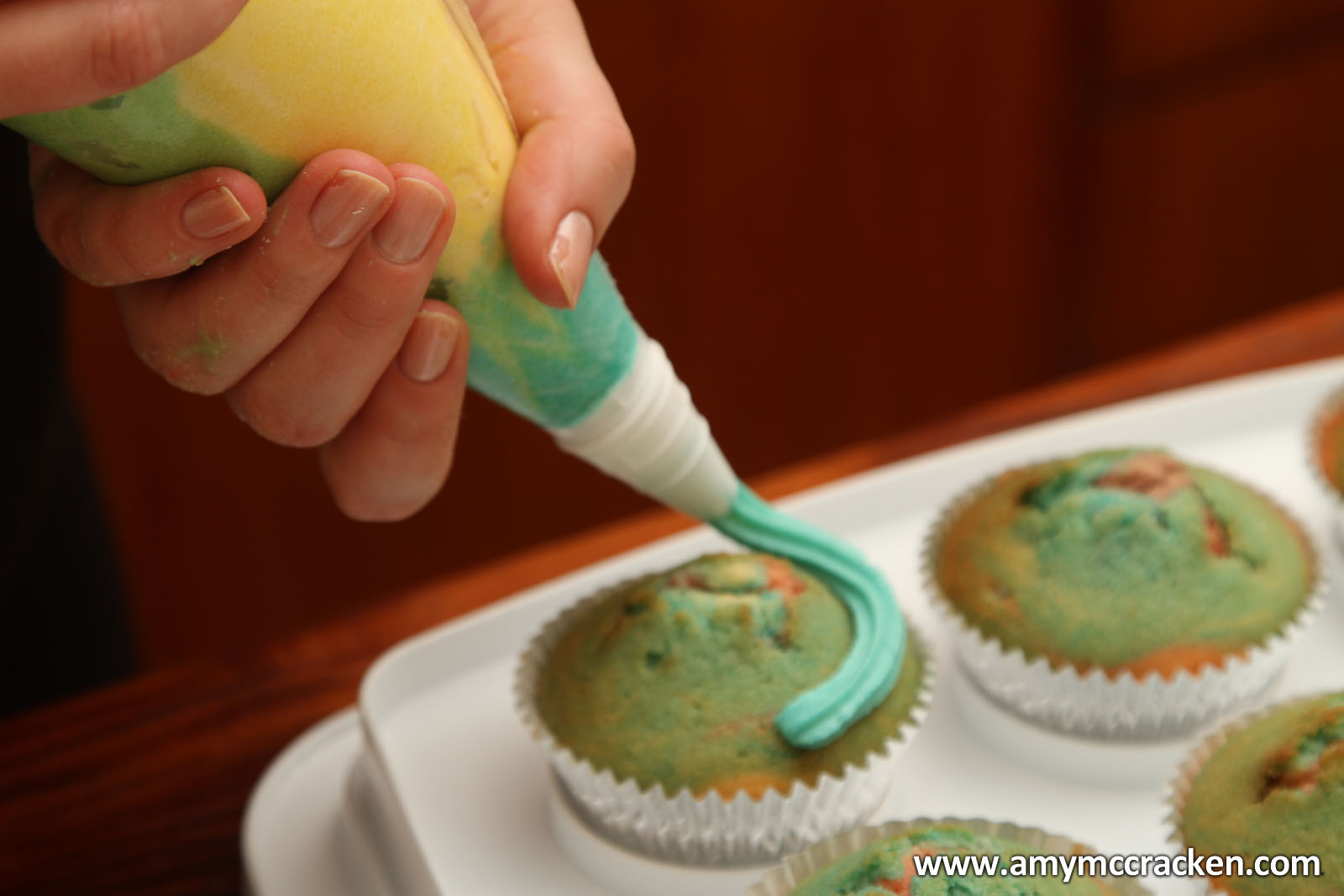 Piping Icing On Cupcakes