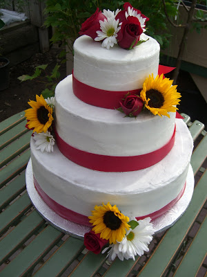 Wedding Cake with Sunflowers and Roses