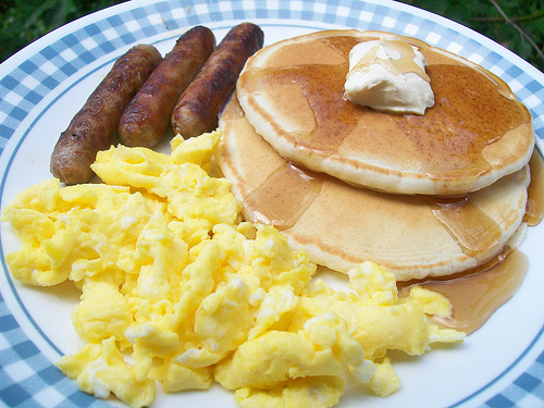 Scrambled Eggs Pancakes and Sausage Breakfast