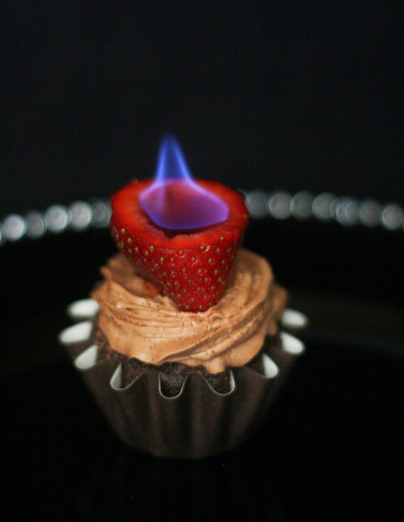 Chocolate Cupcakes with Flaming Strawberries