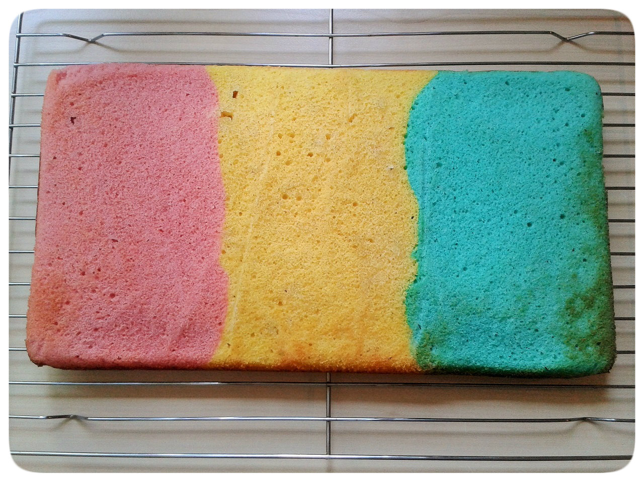 Pink Yellow and Blue Cake