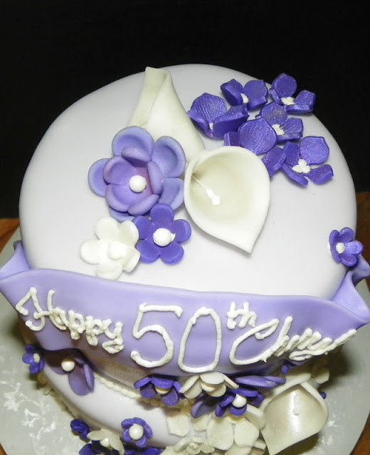 Purple Birthday Cake and Flowers