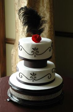 Red and Black Cakes with Feathers Pictures