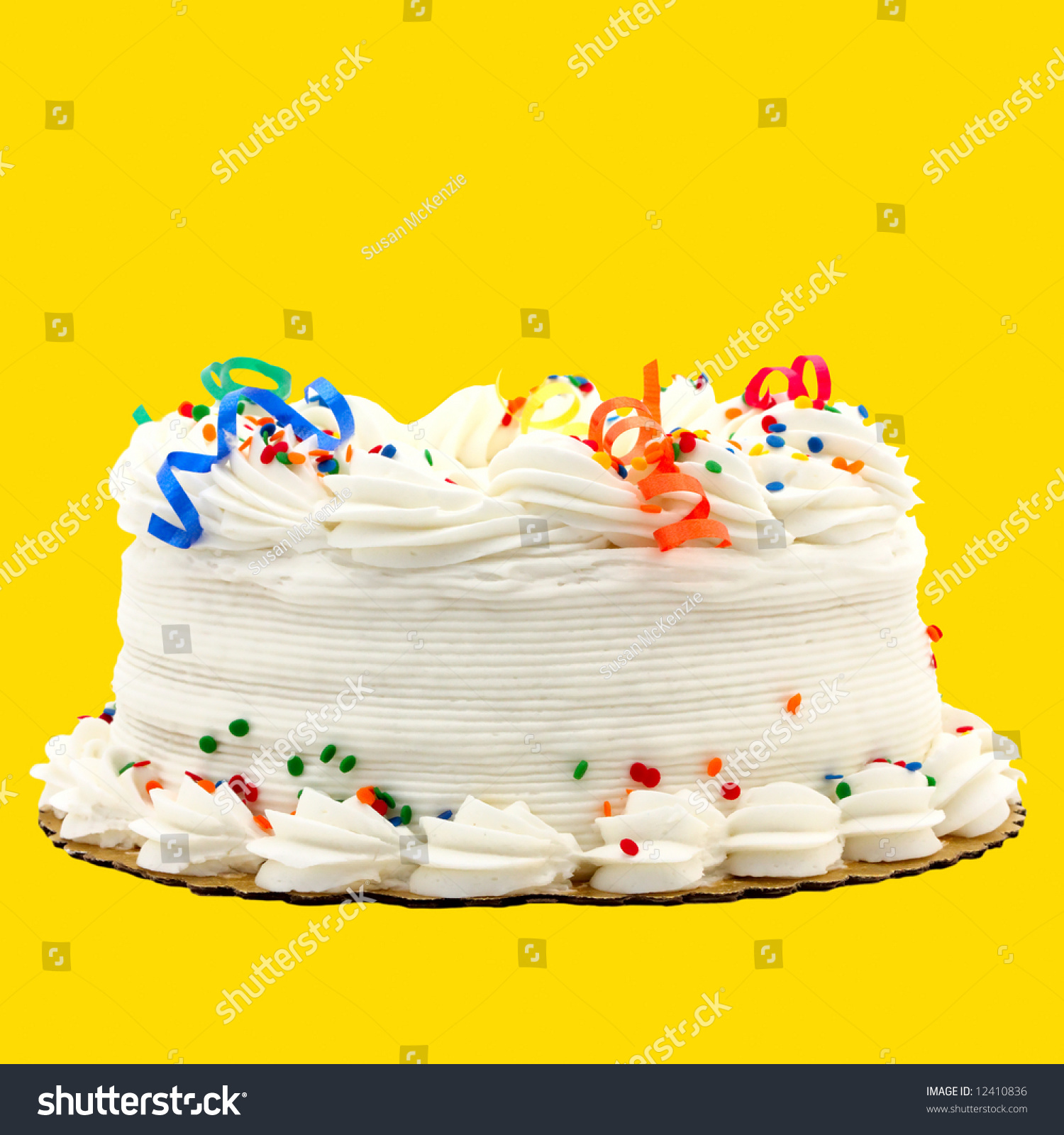 Yellow Cake with Red and Blue Decorations