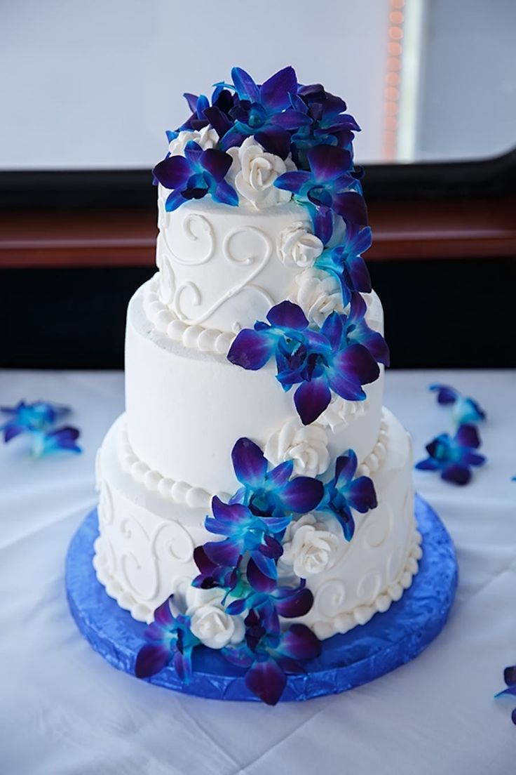 Blue and White Wedding Cake with Flowers