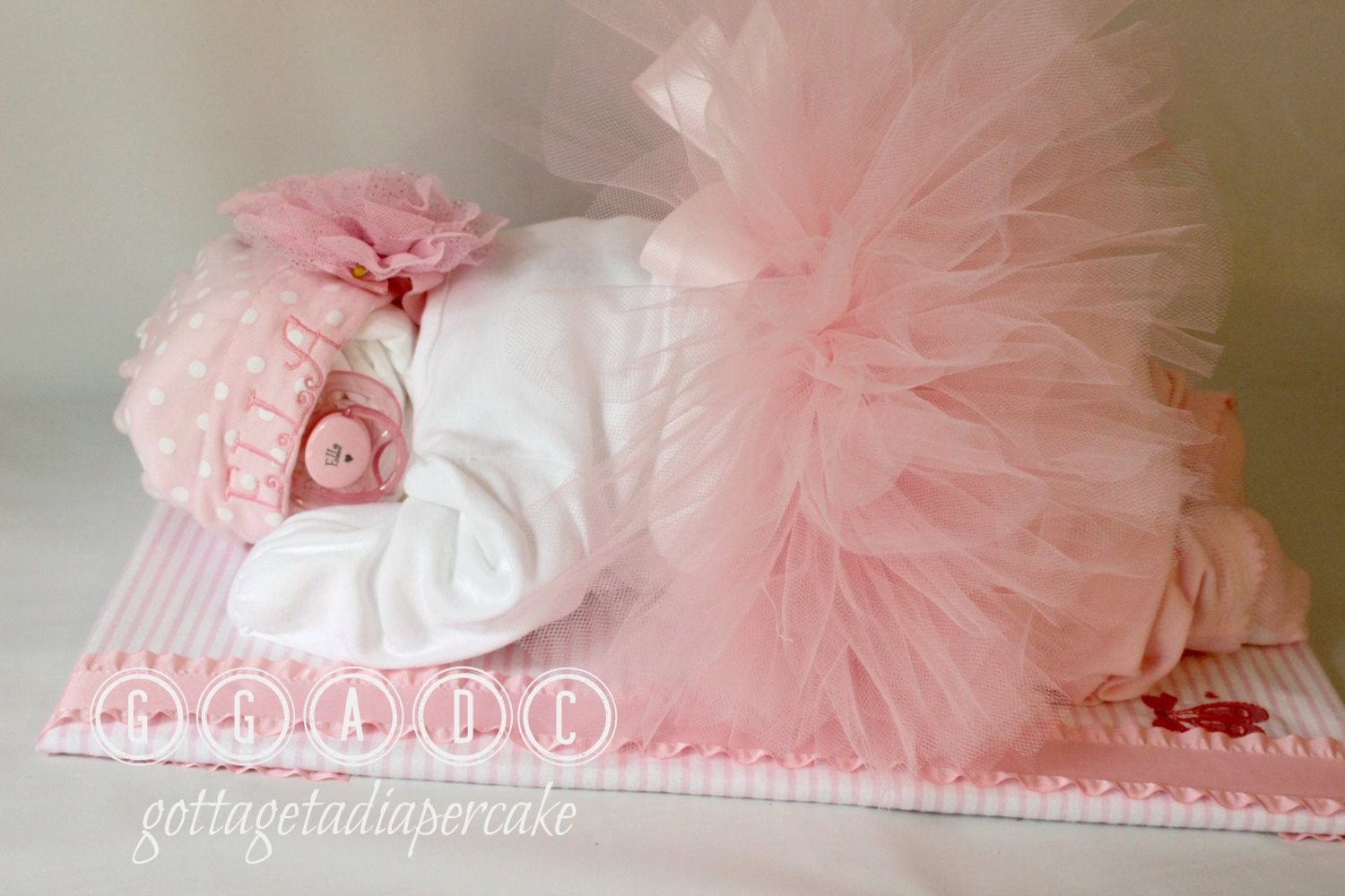 12 Photos of Diaper Cakes For Girls With Tutu For Baby Showers