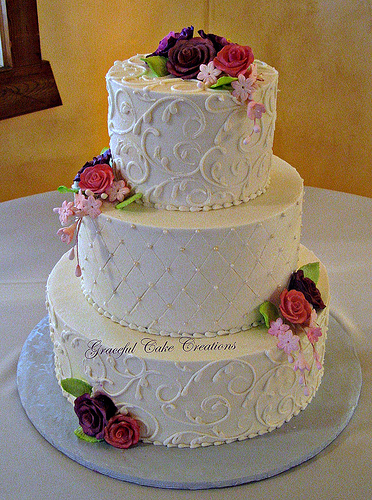Elegant Buttercream Wedding Cake with Flowers
