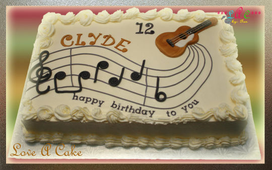 Guitar Themed Birthday Cake