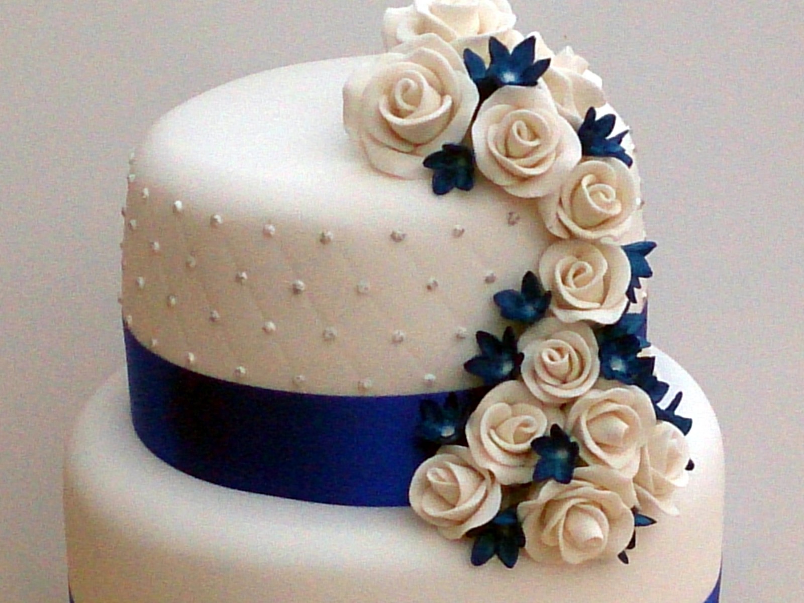 Blue and White 3 Tier Wedding Cakes