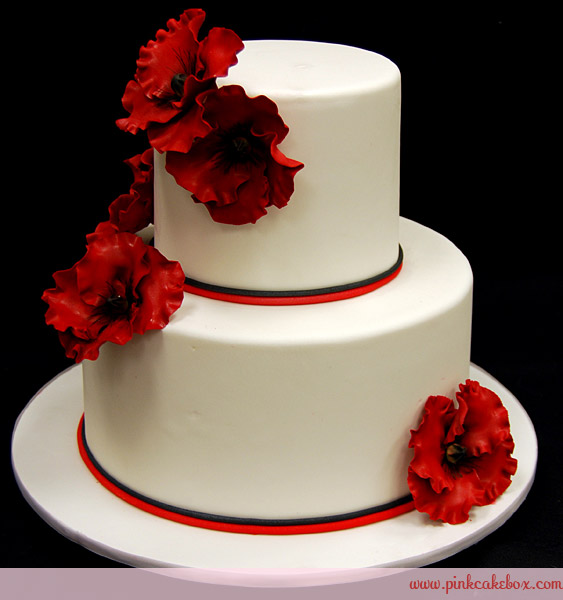 Wedding Cake with Red Flowers