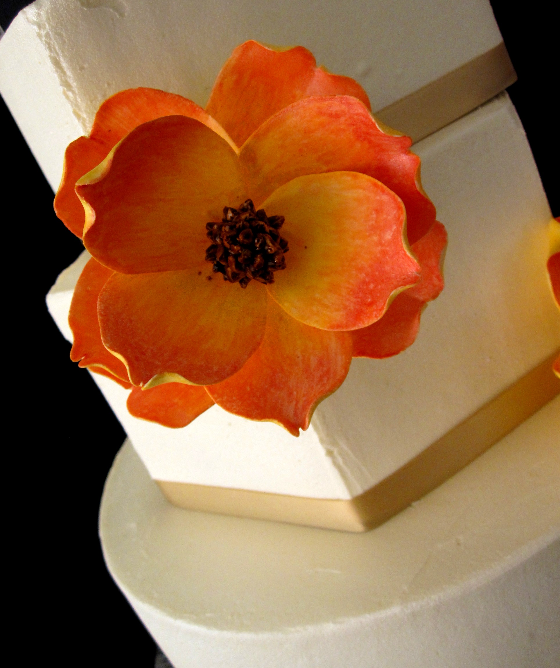 White Wedding Cake with Orange Flowers