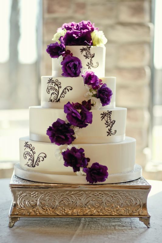 White Wedding Cake with Purple Flowers