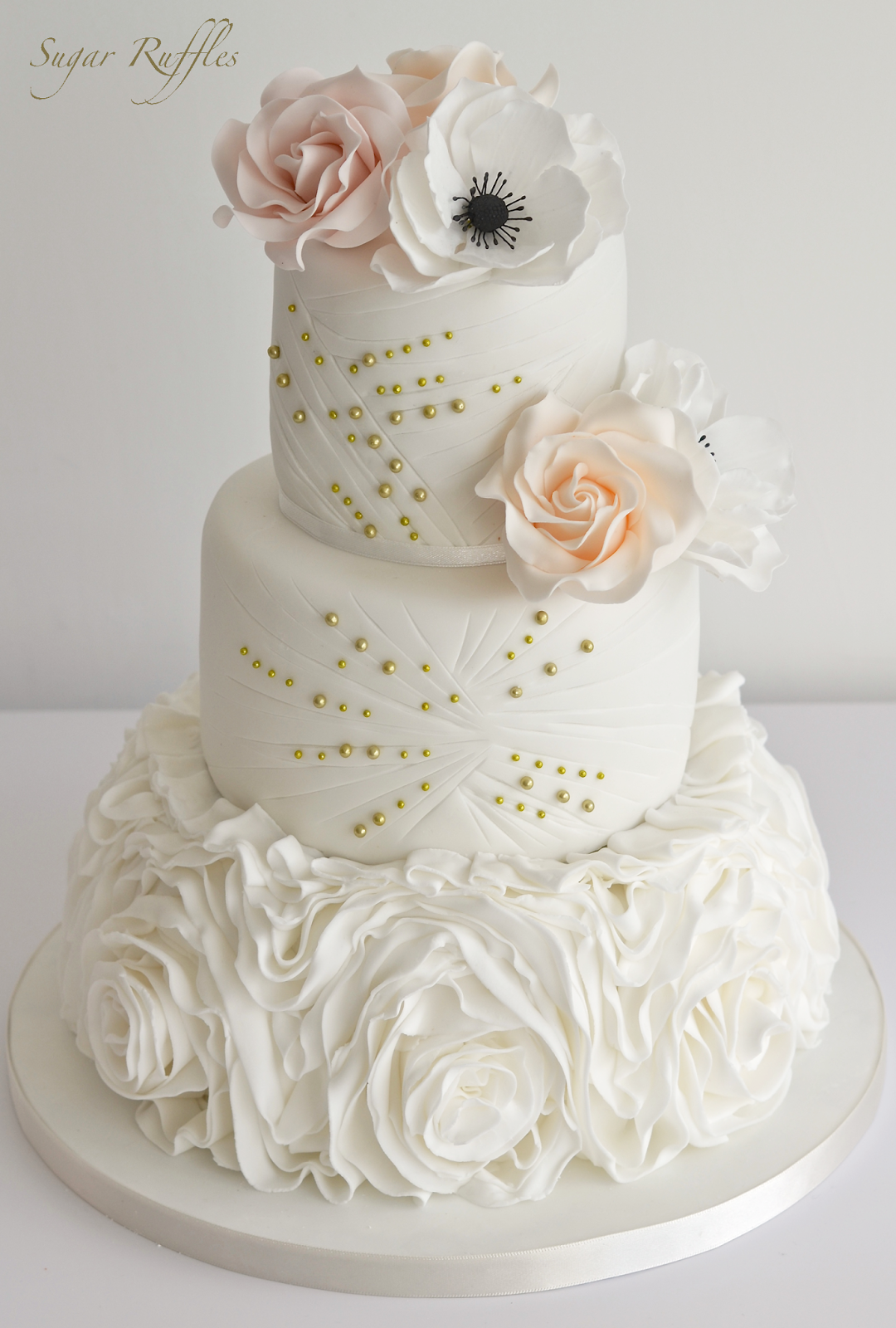 Gold Wedding Cake with Roses