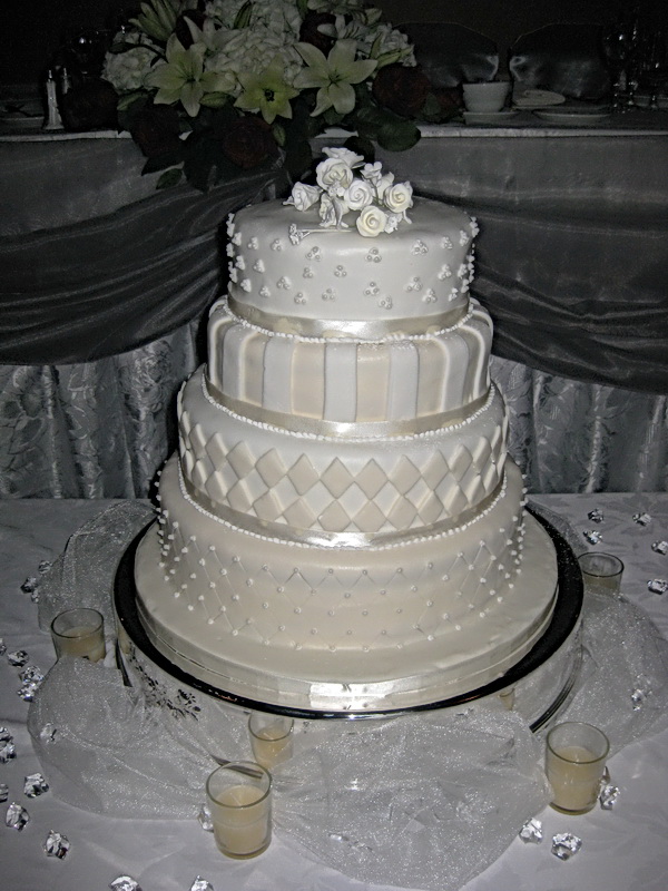 Ivory Four Tier Wedding Cake