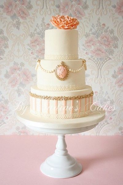Peach Ivory and Gold Wedding Cake