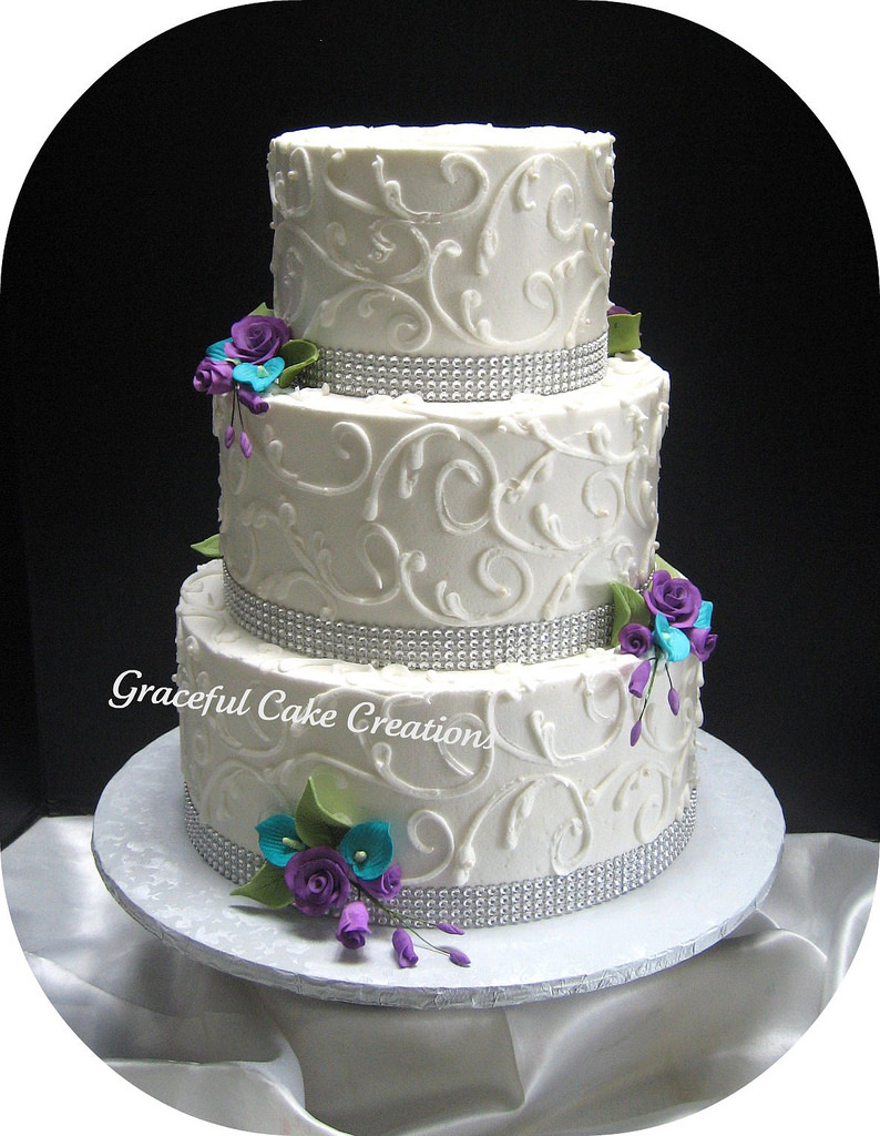Purple and Teal Wedding Cake with Flowers