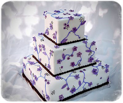White Wedding Cake with Purple Flowers White Wedding Cake with Purple Flowers