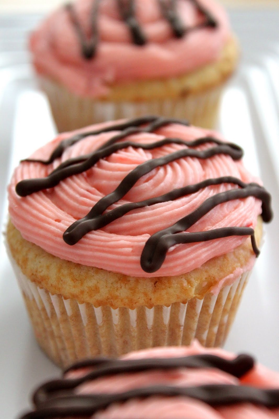 Strawberry Filled Vanilla Cupcakes