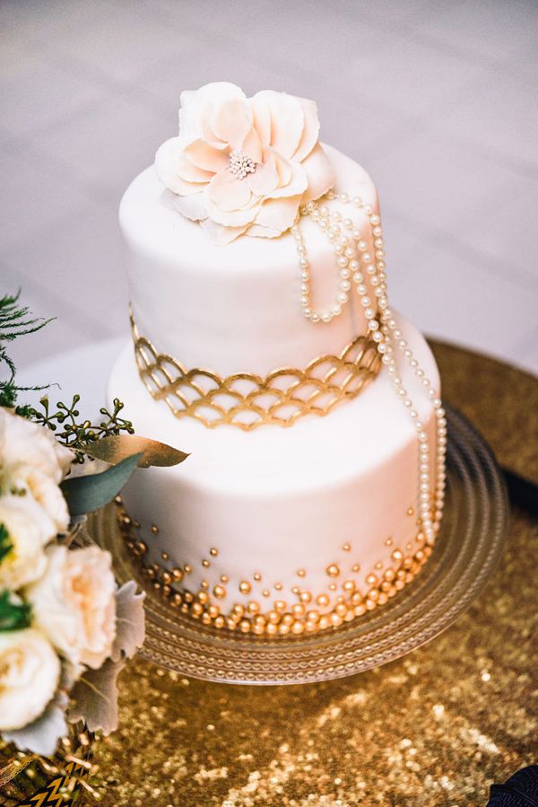 Elegant Gold and Ivory Wedding Cake
