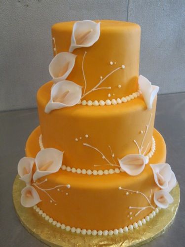 Wedding Cake with Orange Calla Lilies