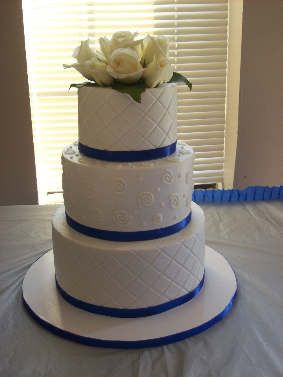 White with Royal Blue Wedding Cakes
