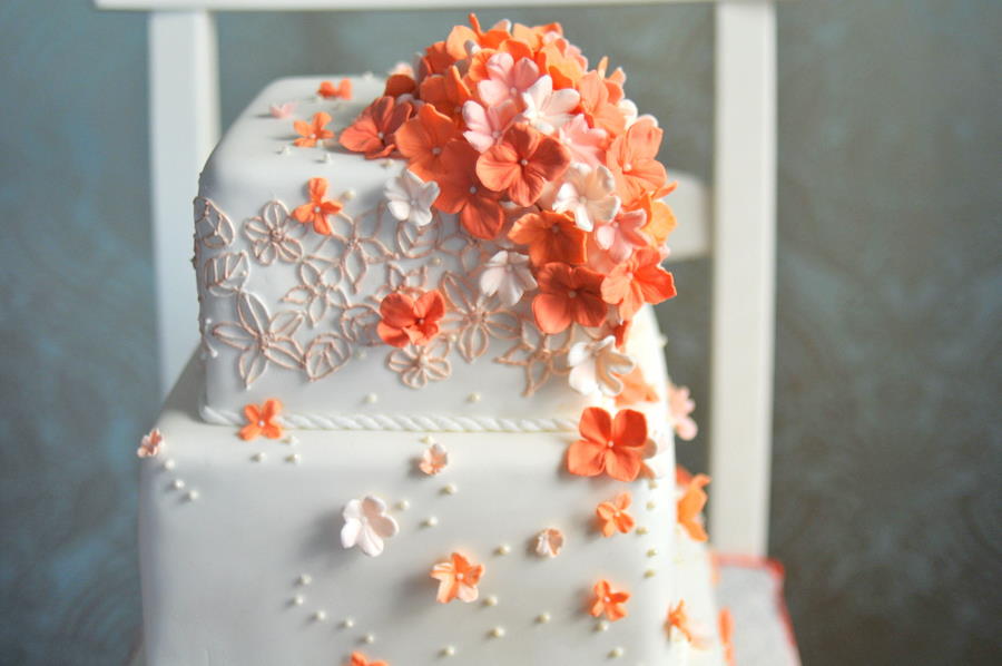 Coral Color Wedding Cake with Flowers