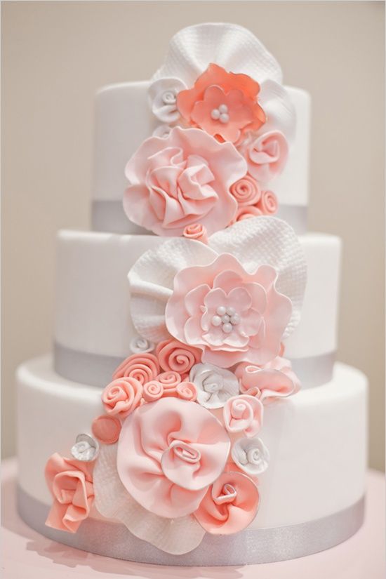Coral Wedding Cake with White Flowers