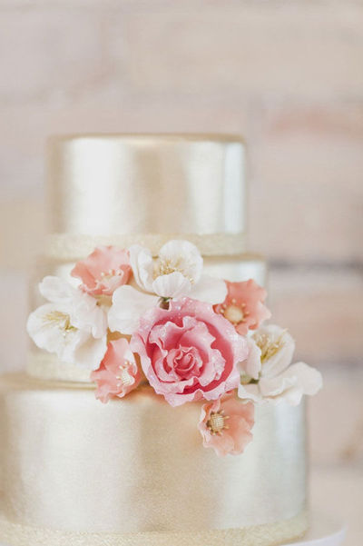 Gold Wedding Cake with Pink Flowers