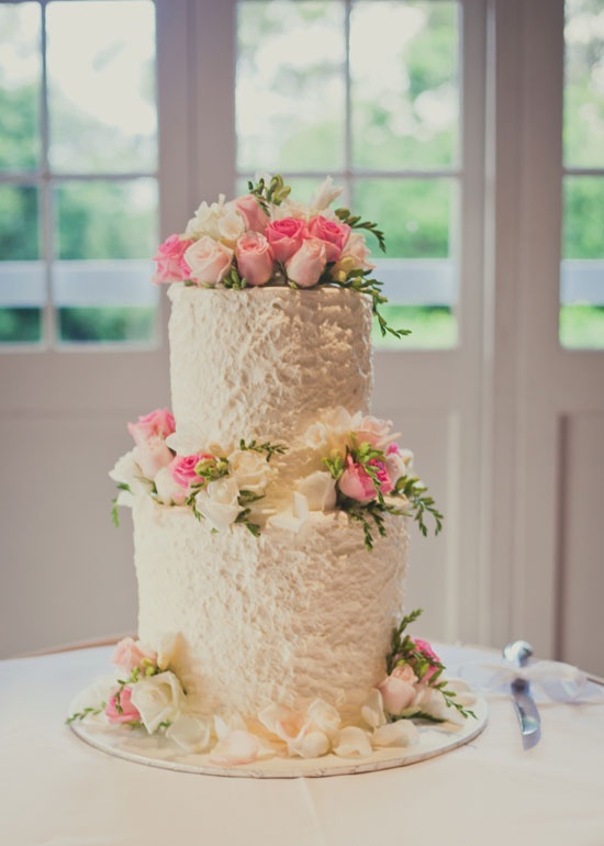 White Wedding Cake with Pastel Pink