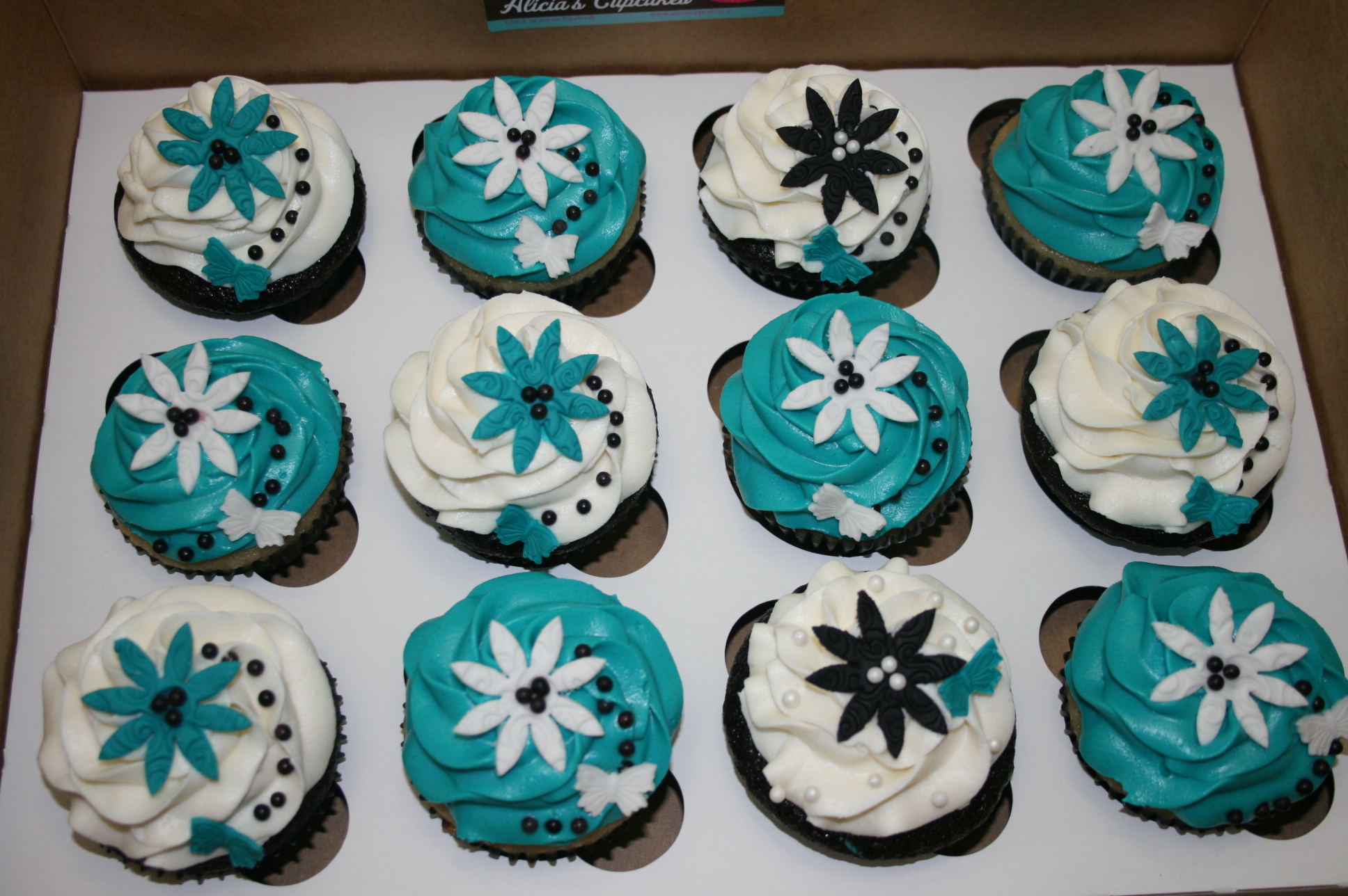 Turquoise and Black Cupcakes