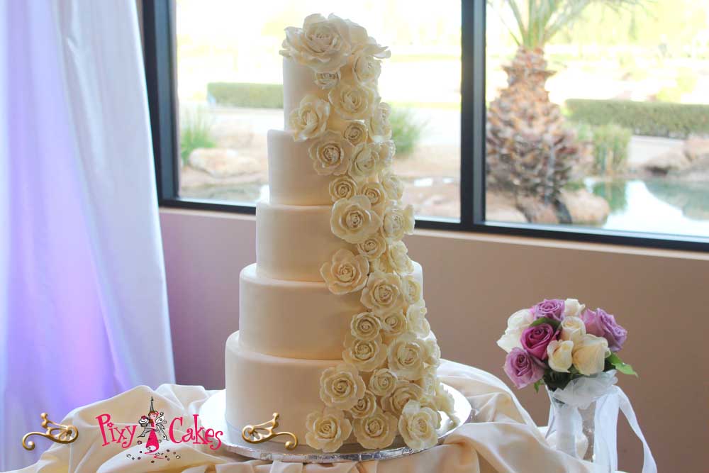 White Wedding Cake with Cascading Flowers