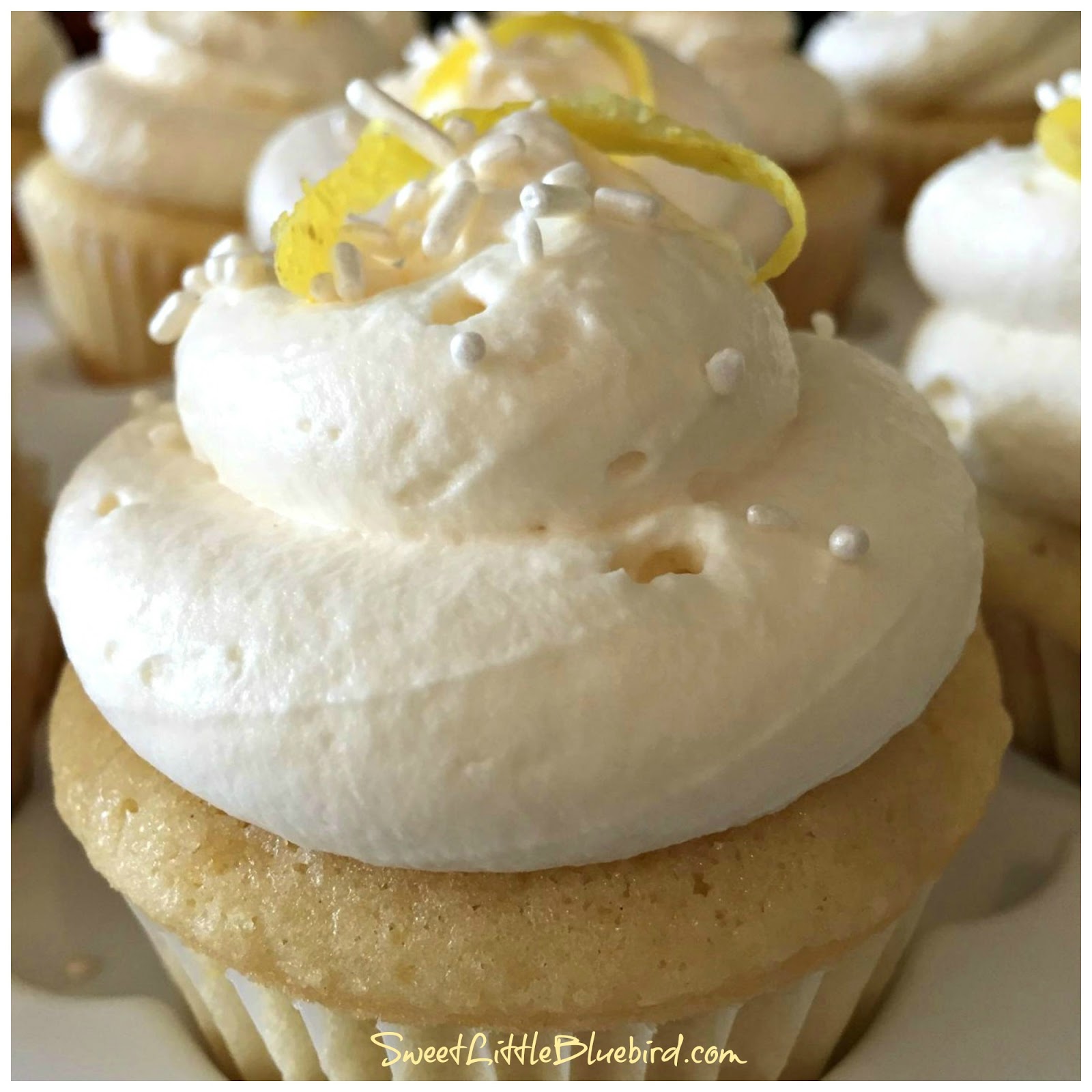 Lemon Cupcakes with Whipped Cream Frosting