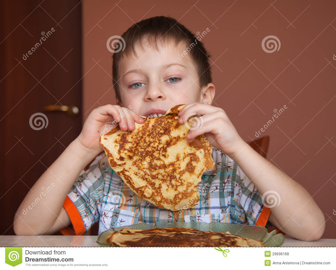 Boy Eating Pancakes