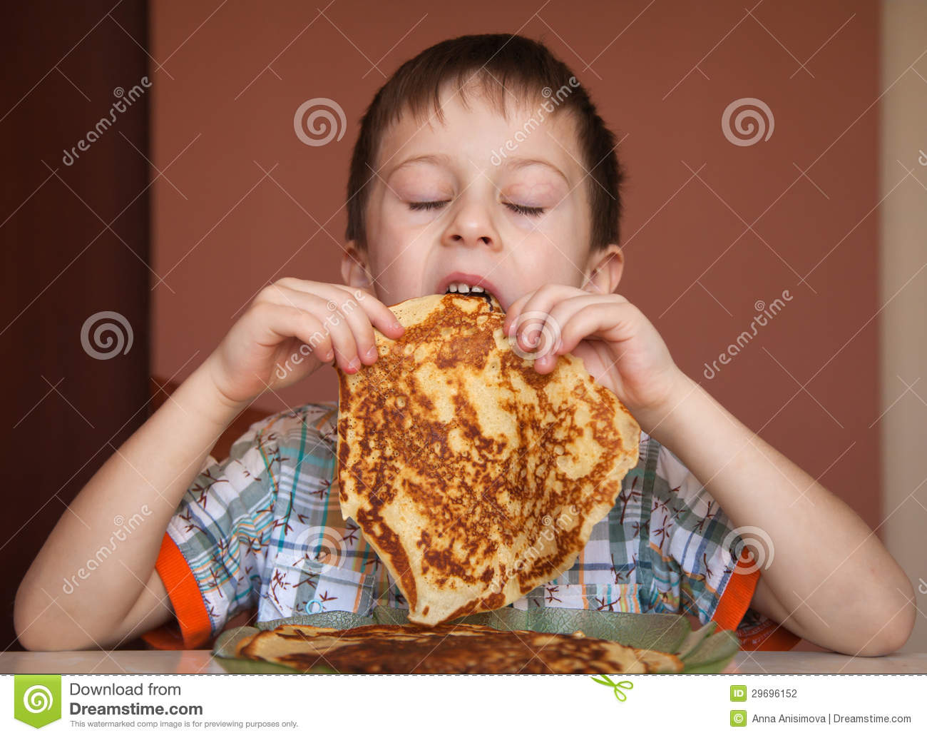 Boy Eating Pancakes