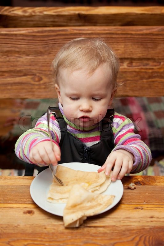 Girl Eating Pancakes