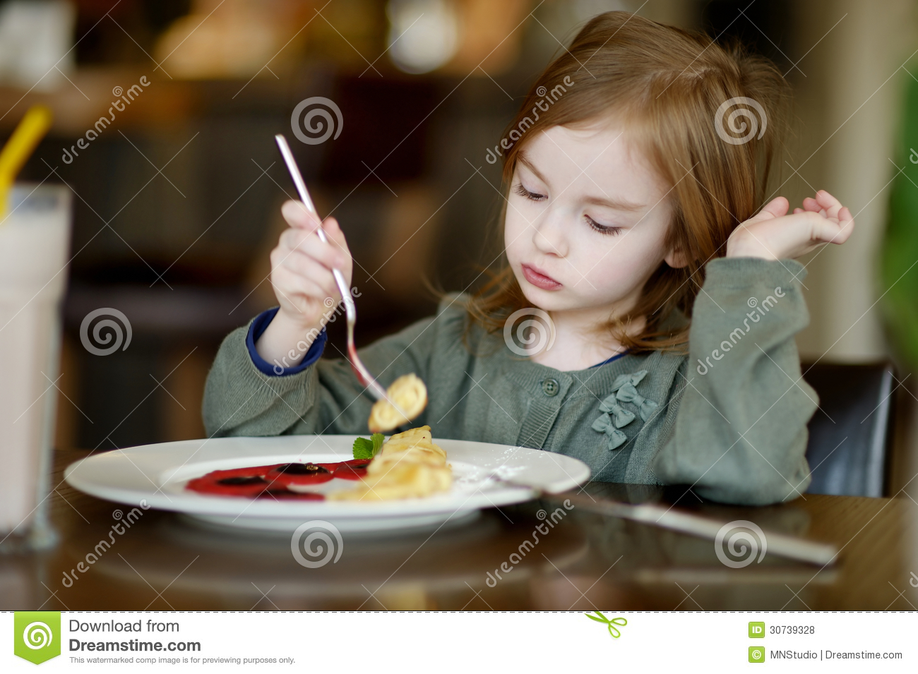 Little Girl Eating Pancakes Little Girl Eating Pancakes