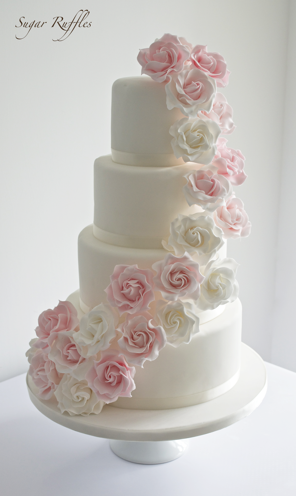 White Wedding Cake with Pink Roses White Wedding Cake with Pink Roses