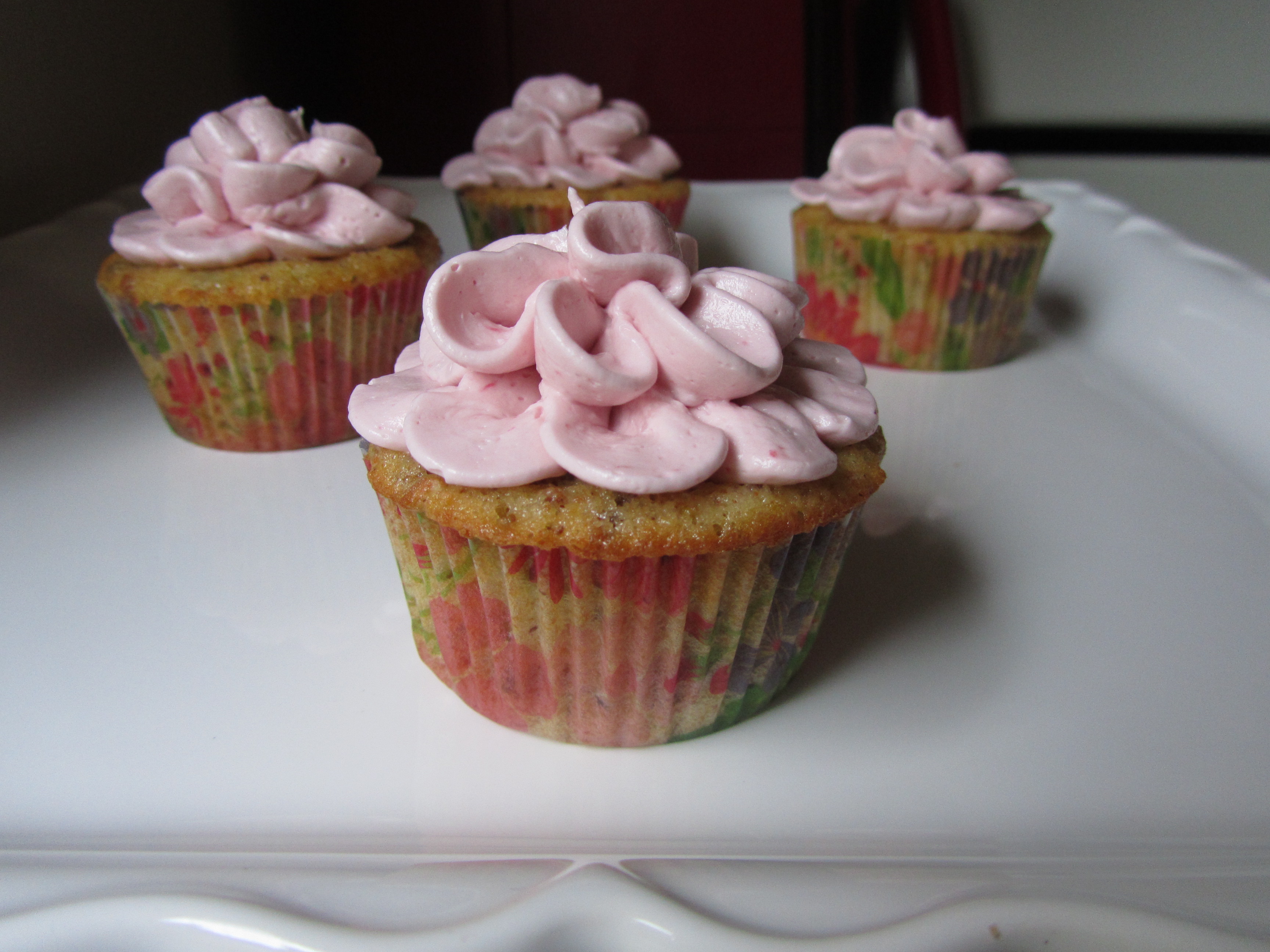 Pistachio Cupcakes with Raspberry Buttercream