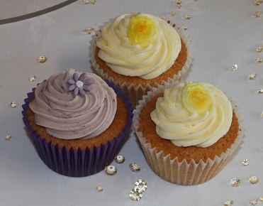Purple Wedding Cake with Cupcakes