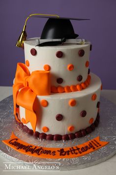 5 Photos of Orange And Black Graduation Tier Cakes