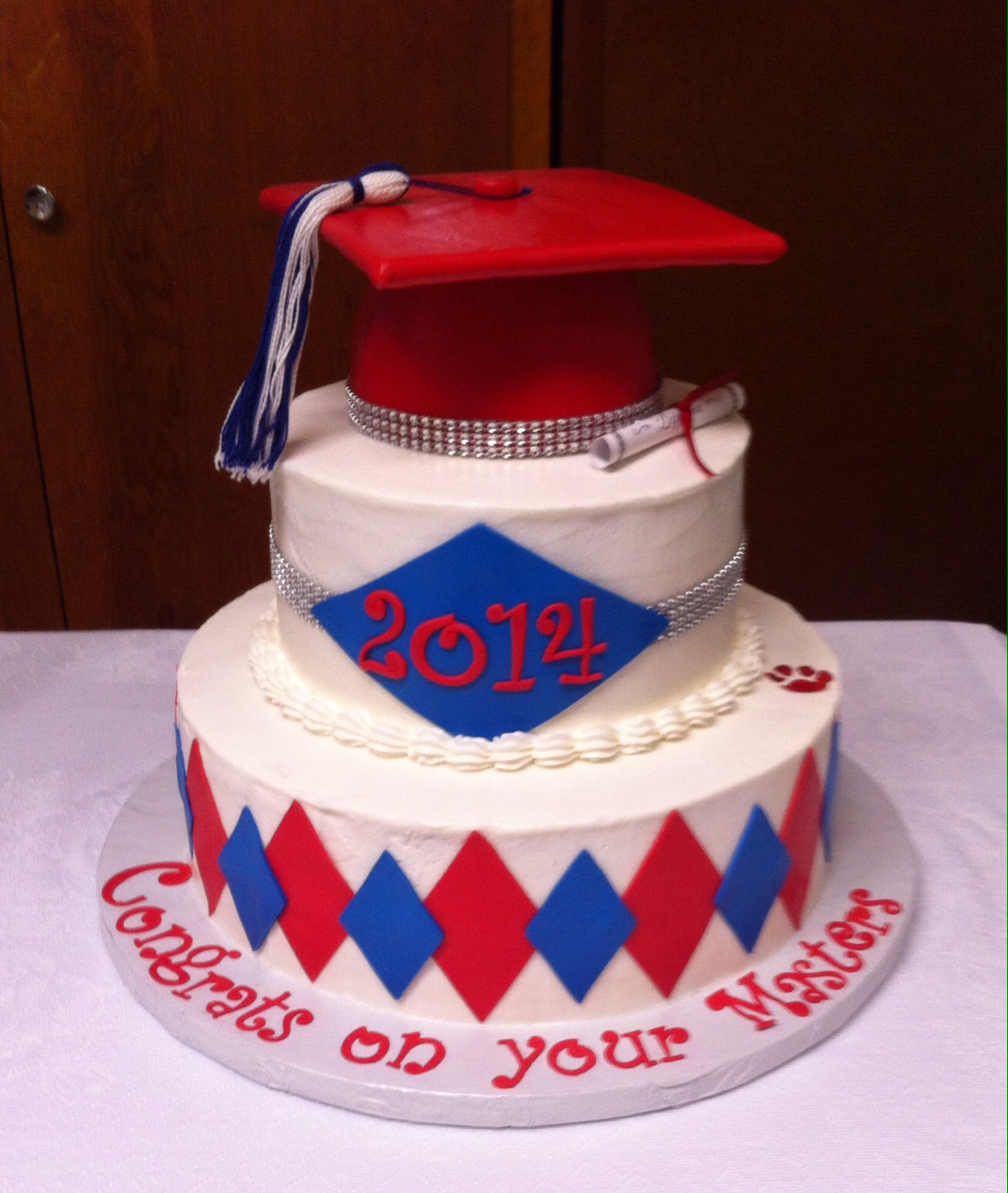 Three-Tiered Graduation Cake Three-Tiered Graduation Cake